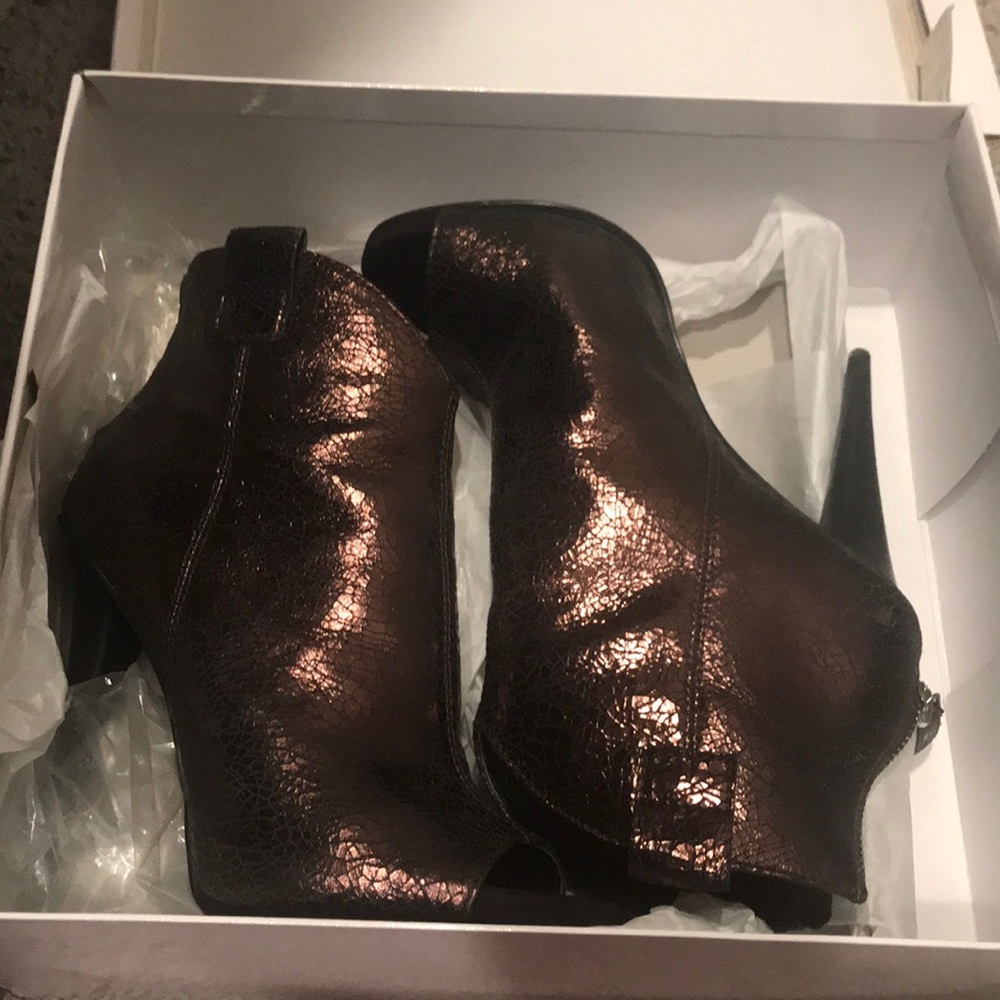 Metalic brown booties.